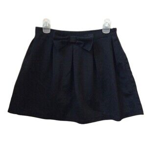 BETHANY MOTA JUNIORS MEDIUM BLACK OPEN PLEAT A LINE BOW SKIRT